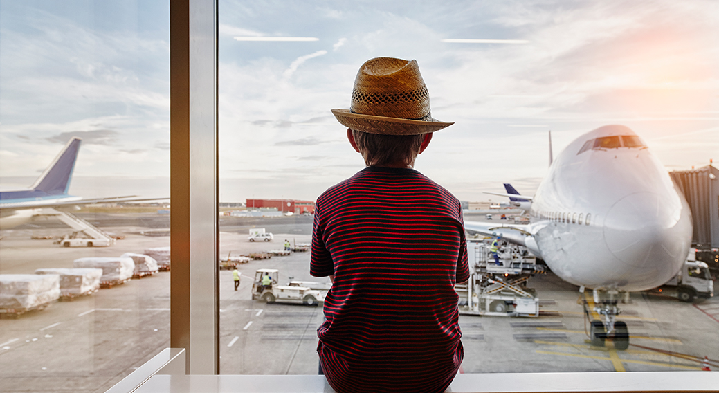 boy-watching-airplanes