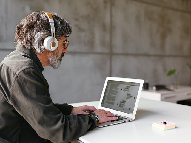 man-looking-at-laptop